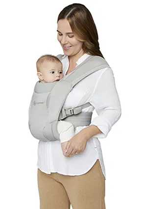 Mom using Embrace Baby Front Carry